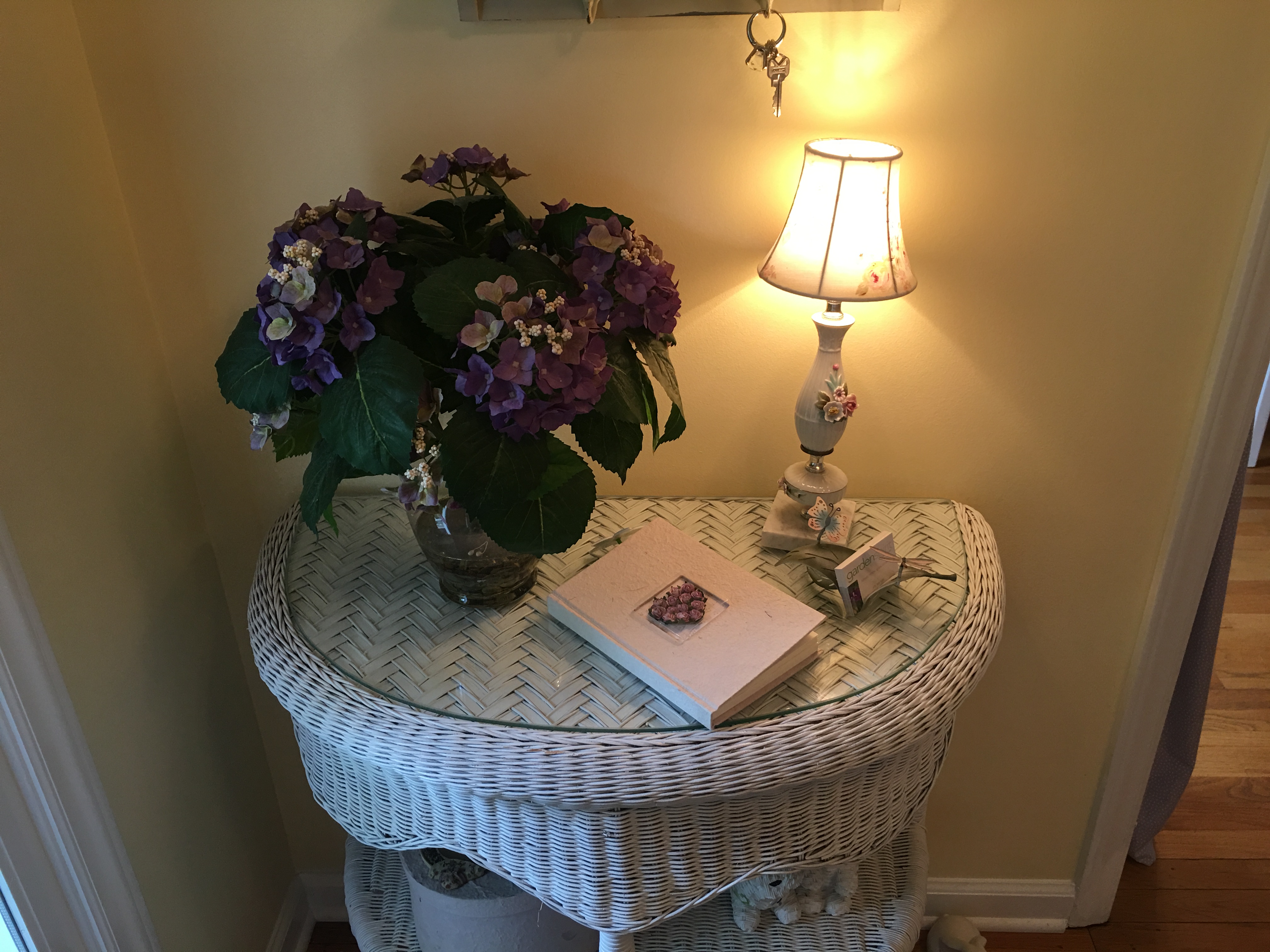 The dainty entry table with guest book.