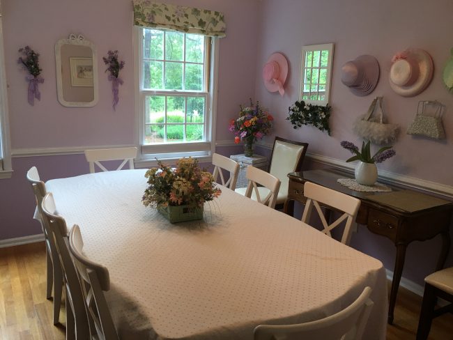 Purple Dining Room right off the foyer seats 6-8. Don a hat and lift your pinky at tea time!