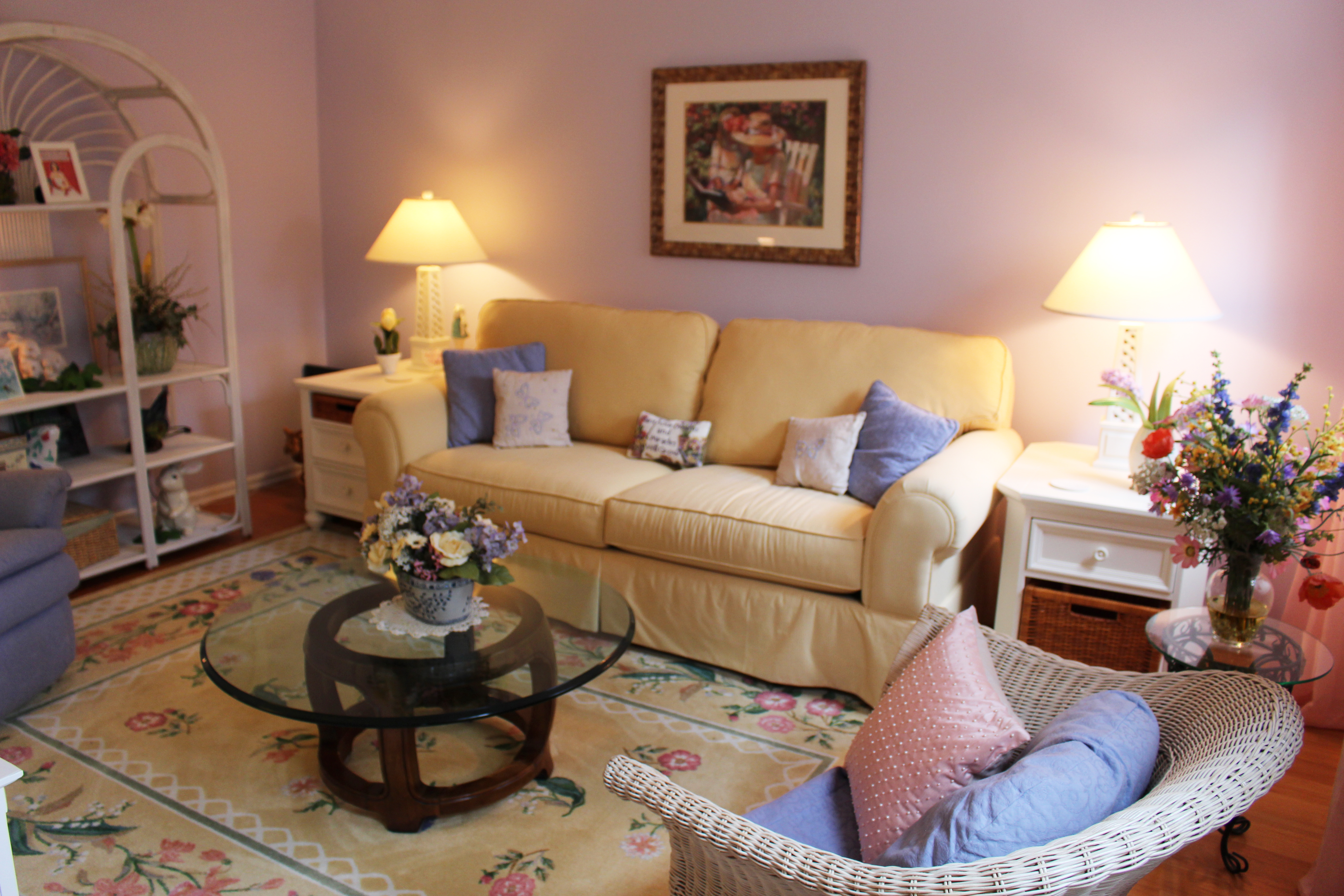 Living room is decorated in soft, soothing pastels.